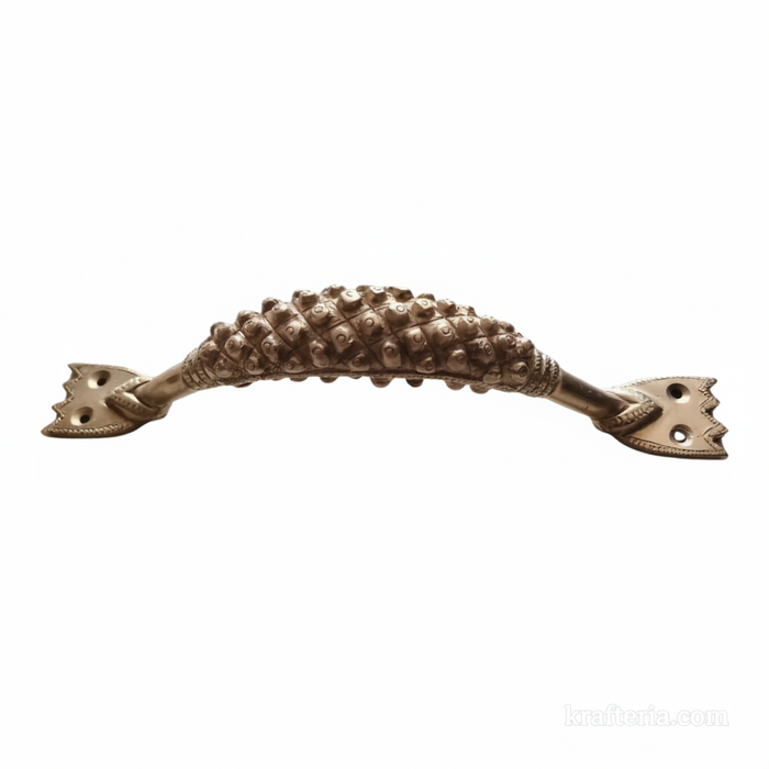 Antique brass door handle with textured finish for decorative home hardware.
