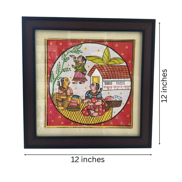 Framed cheriyal village life painting with vibrant Indian folk art detailing.