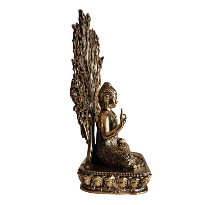 Brass Meditating Gautama Buddha statue under a Bodhi tree.