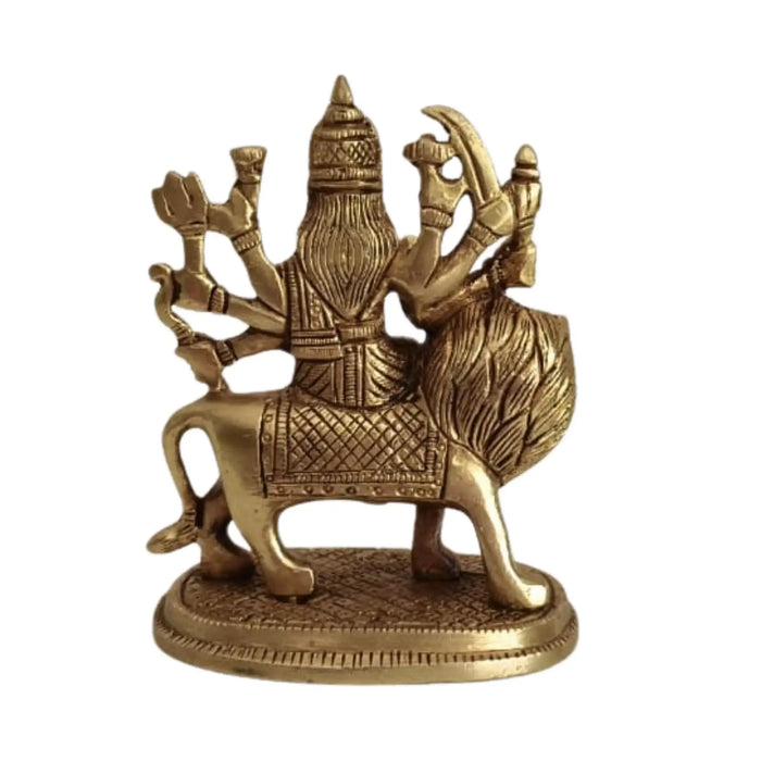 Brass Goddess Durga idol, divine protector, riding a lion, brassware.