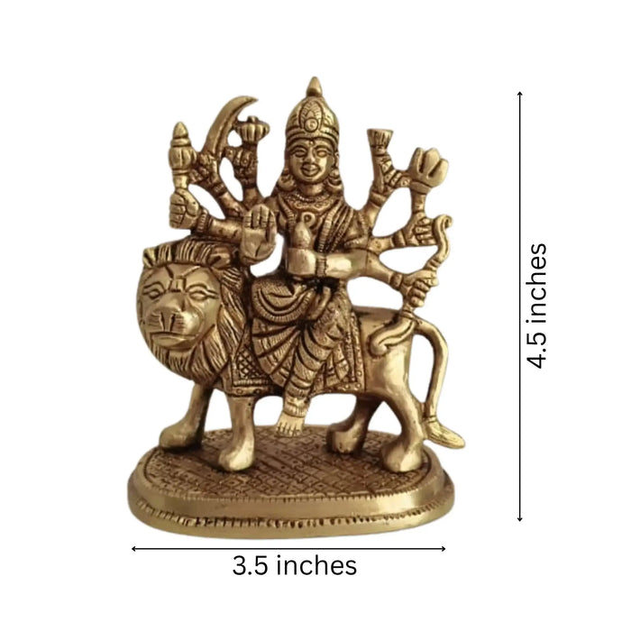 Brass Goddess Durga idol riding lion, a divine protector.