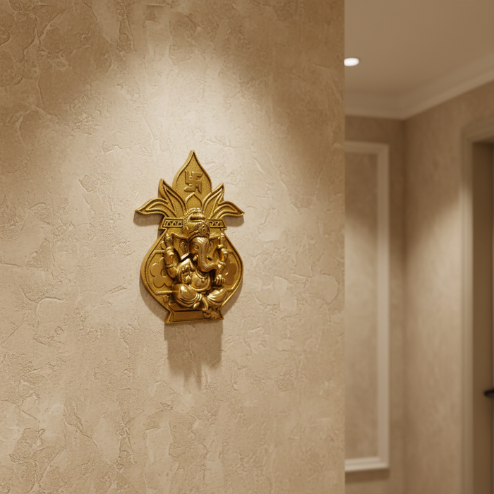 Brass Ganesha wall hanging in a Kalash with Swastika.