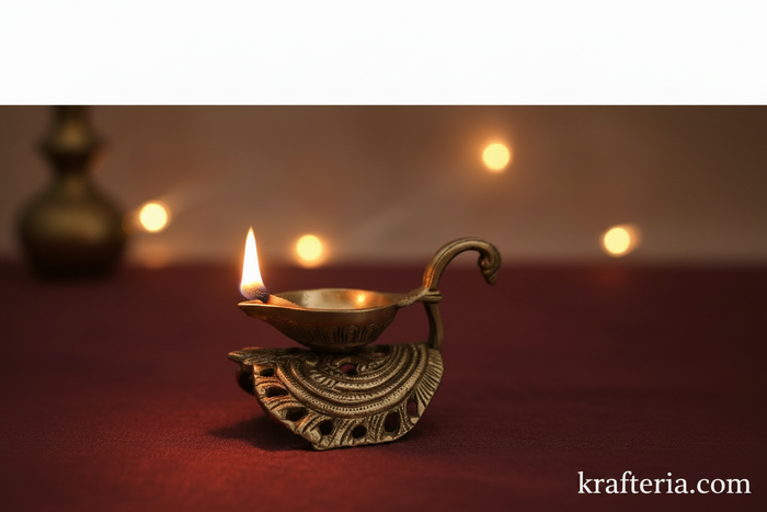 Intricate brass diya lamp with swan handle, a traditional oil lamp for rituals.
