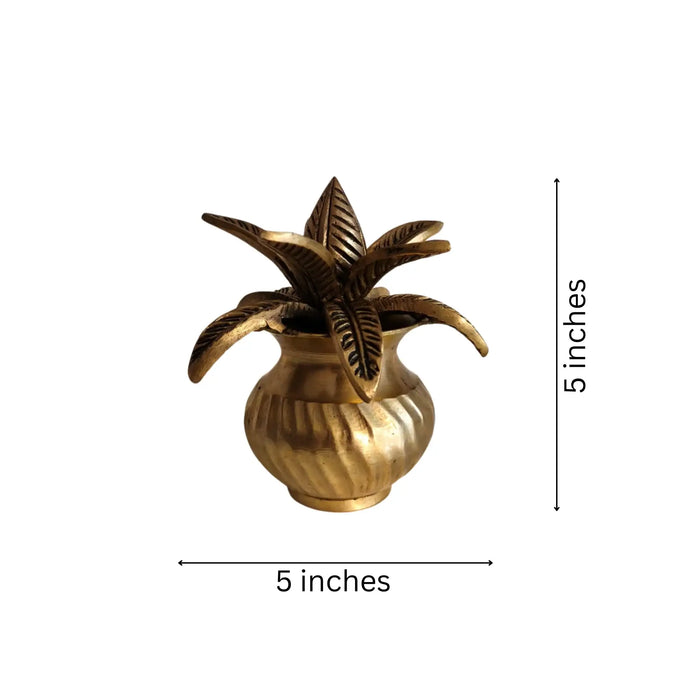 Beautiful brass kalasha with lotus leaves, a decorative brass kalasa.