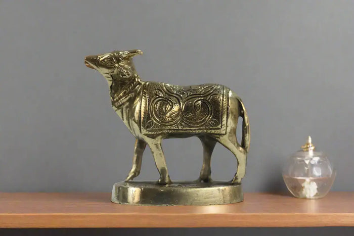 Brass Kamadhenu Cow Statue – Elegant Home Décor Accent   Brass Ware