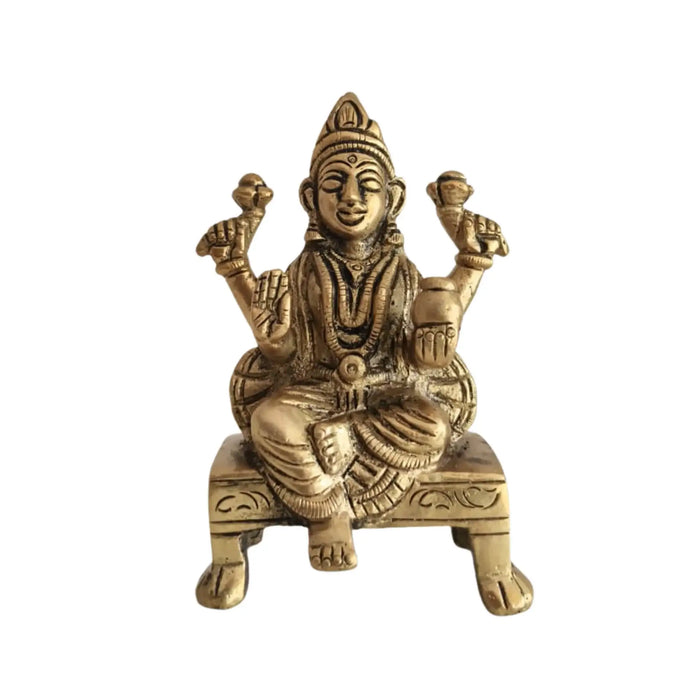 Beautiful brass Lakshmi and Ganesha idols, perfect for your altar.
