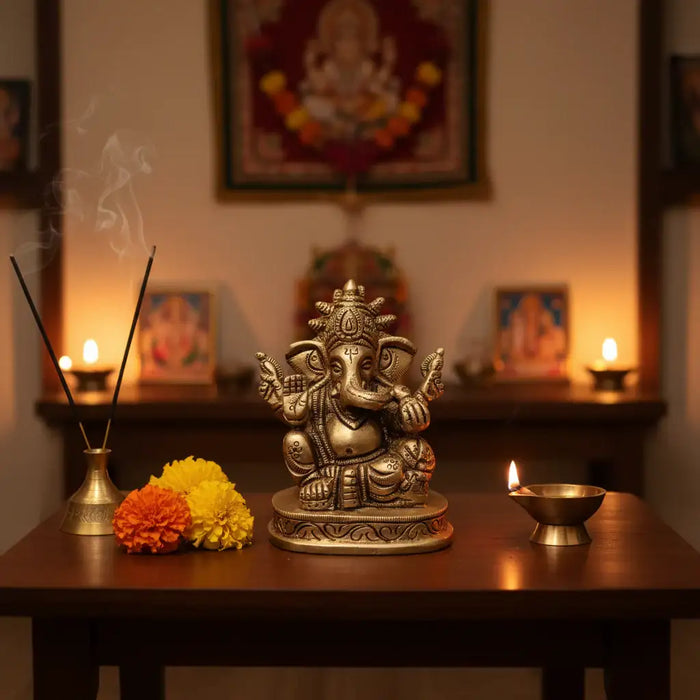 Brass Lord Ganesha Idol – Seated Four-Armed Remover of Obstacles for Auspicious Beginnings   Brass Ware