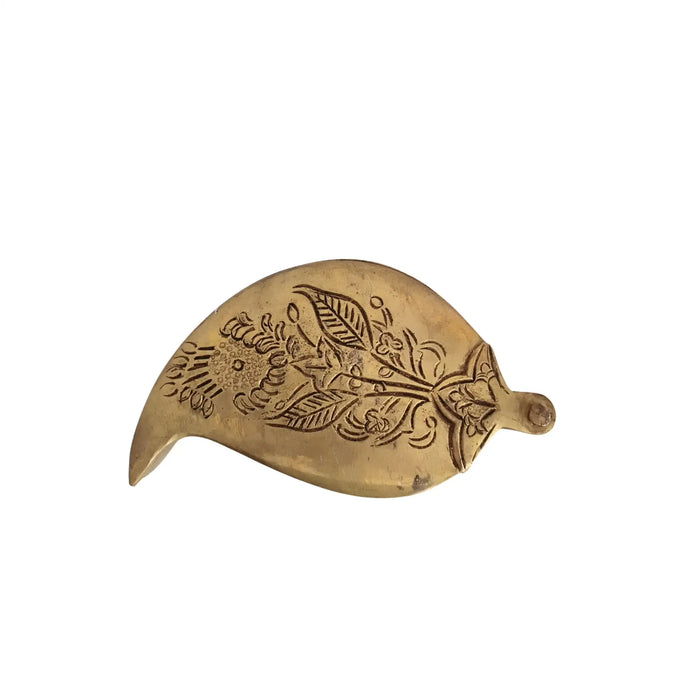 Engraved brass mango shaped decorative box for storage.