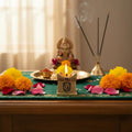 Ornate brass multi wick diya featuring Om symbols. Religious brass lamps.