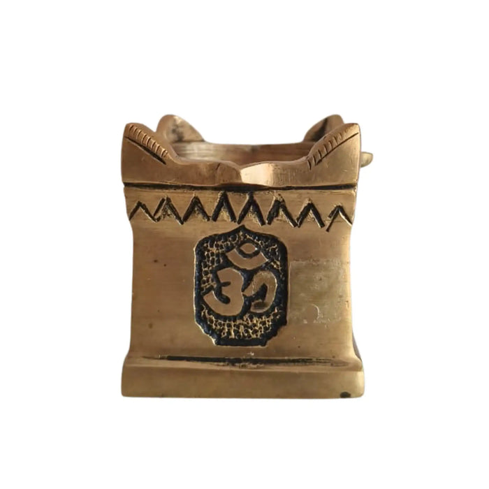 Brass multi wick diya with Om symbols, a decorative religious brass lamp.
