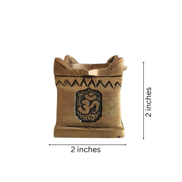 Brass multi wick diya with Om symbols, a religious brass lamp.