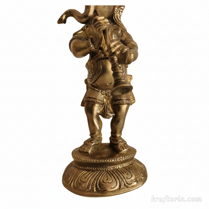 Brass Ganesha statue with intricate details, perfect for home and spiritual decor.