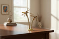 Brass palm tree decor accent for tabletop and home.