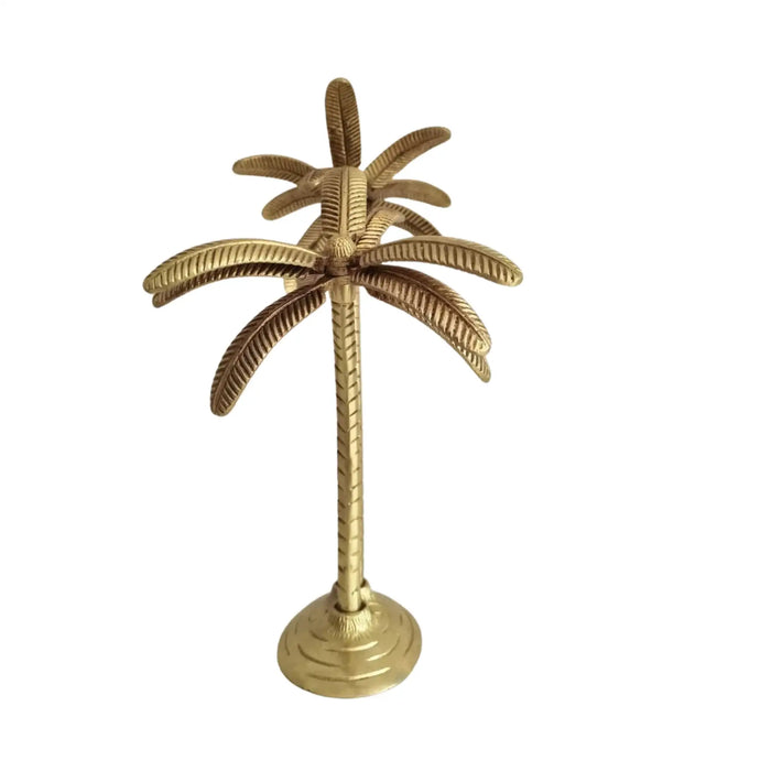 Elegant brass palm tree decor, a tropical metal tabletop accent for your home.