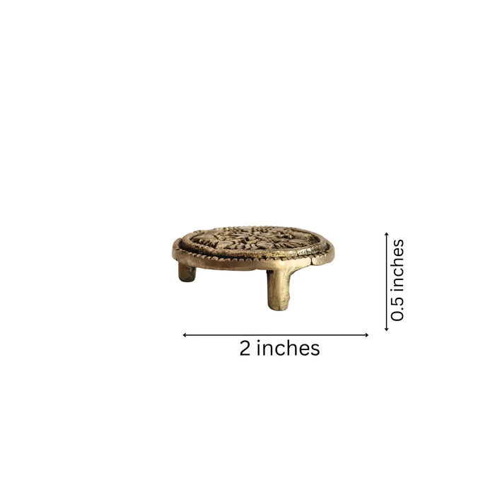 Brass pedestal stand, a round ritual holder made of polished brass.