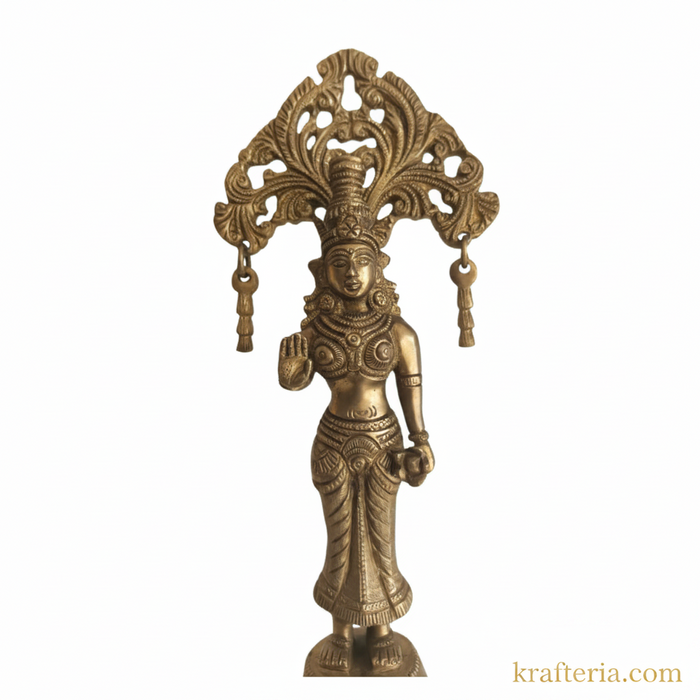 Brass Radha goddess idol with ornate prabhavali, a traditional brass religious statue.