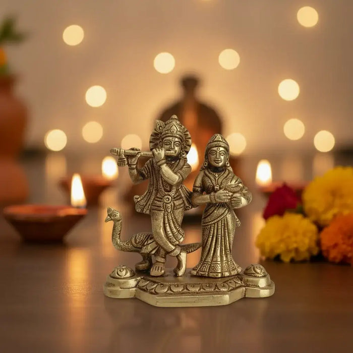 Brass Radha Krishna Idol with Flute and Peacock – Symbol of Eternal Love and Devotion   Brass Ware