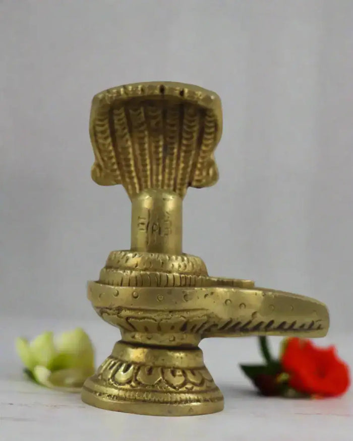 Brass Shivalingam with Serpent Hood – Spiritual Idol for Worship   Brass Ware