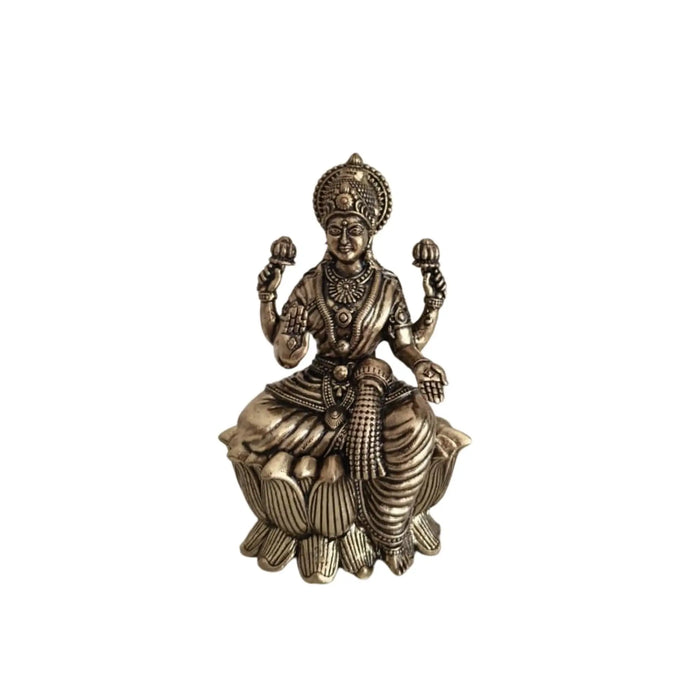 Classic Four-Armed Brass Lakshmi Idol Seated on Lotus - Symbol of Prosperity   Brass Ware