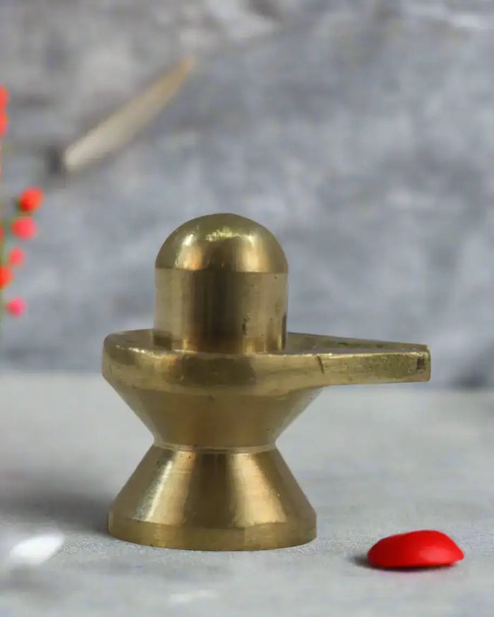 Divine Brass Shivaling Idol – Symbol of Lord Shiva’s Energy   Brass Ware