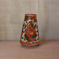 Decorative lampshade with colorful design on a white background