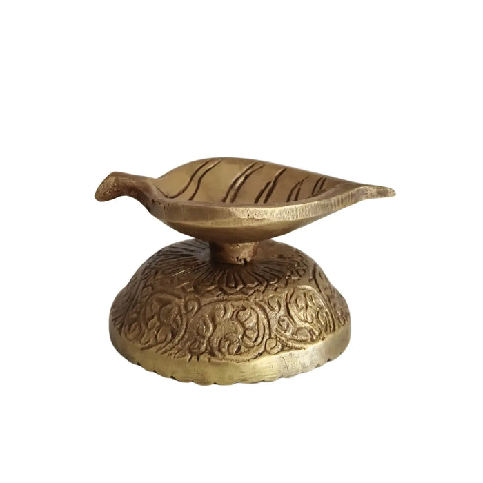 Elegant Brass Leaf-Shaped Diya with Carved Base   Brass Ware