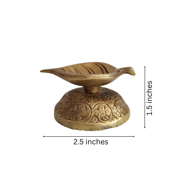 Elegant Brass Leaf-Shaped Diya with Carved Base   Brass Ware