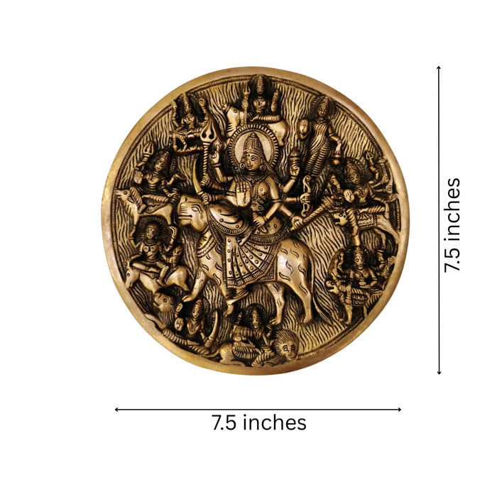 Brass Vishnu and Durga hanging in the center.