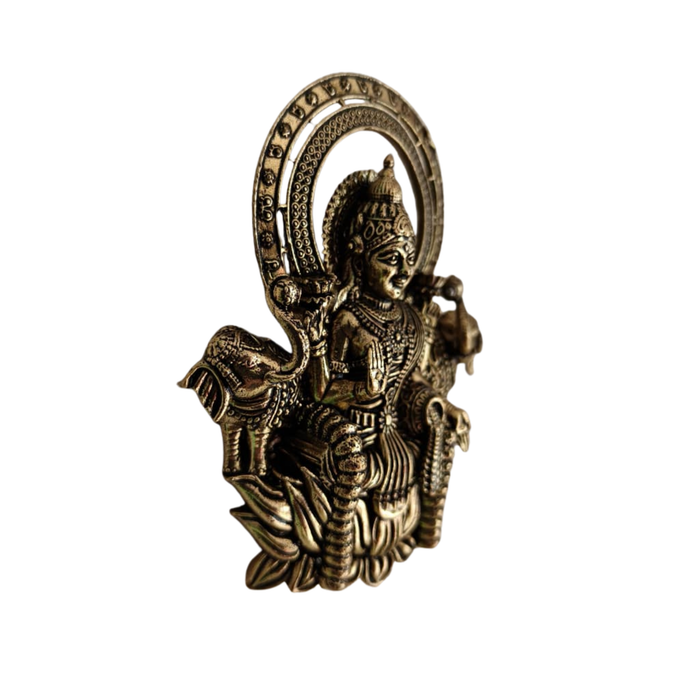 Brass Gajalakshmi wall hanging in brass finish, intricate Indian wall art.