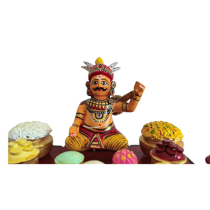 Ghatotkacha Kondapalli Eating Doll at a feast, traditional epic art.