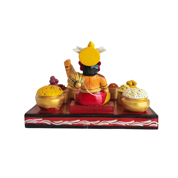 Ghatotkacha Kondapalli eating doll set showcasing a feast, traditional epic art.