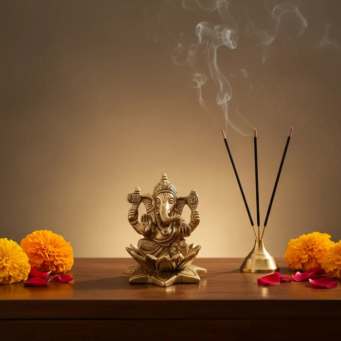 Golden Brass Ganesha Idol Seated on a lotus, intricate brass ware.