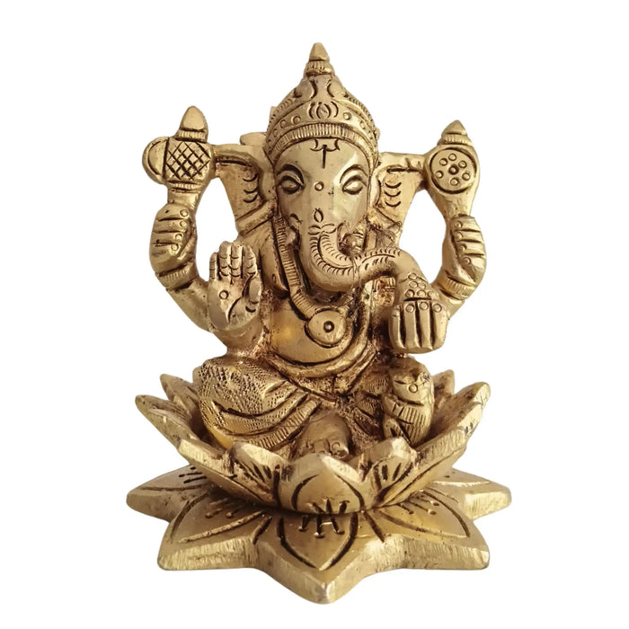 Golden Brass Ganesha Idol Seated on a lotus, intricate detail.