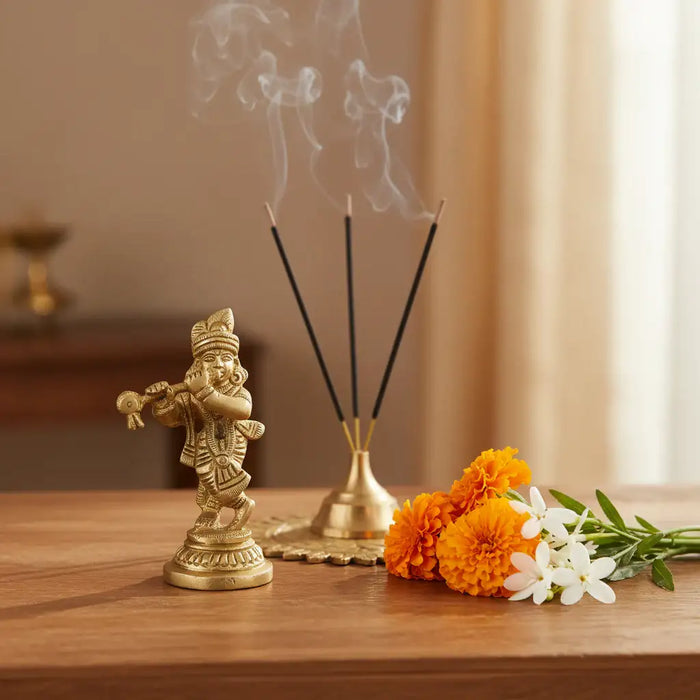 Golden brass Lord Krishna idol playing flute, a beautiful Krishna murti crafted from brass ware.