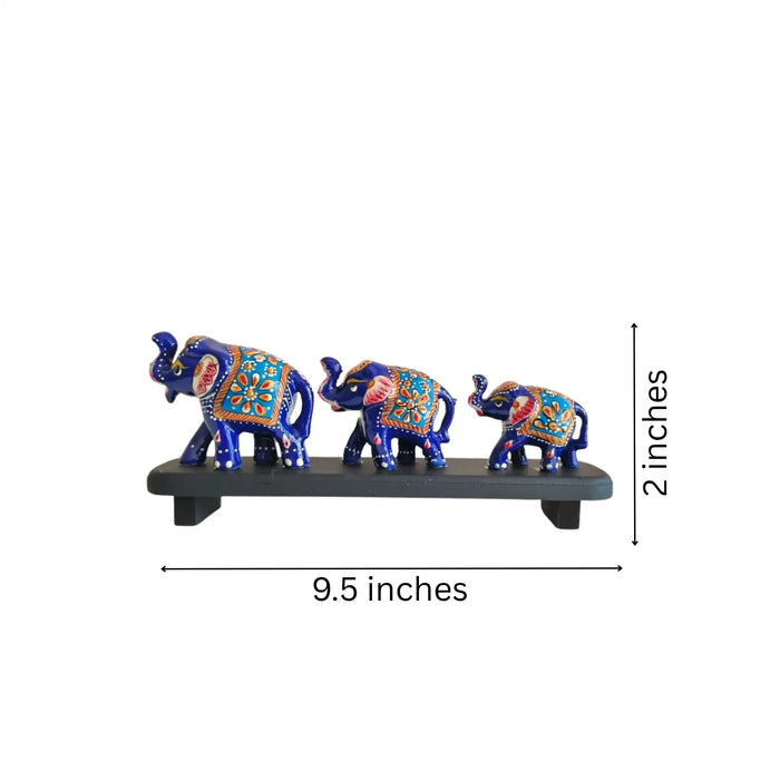 Hand-Painted Blue Elephant Family Figurines on Display   Wood Decorative