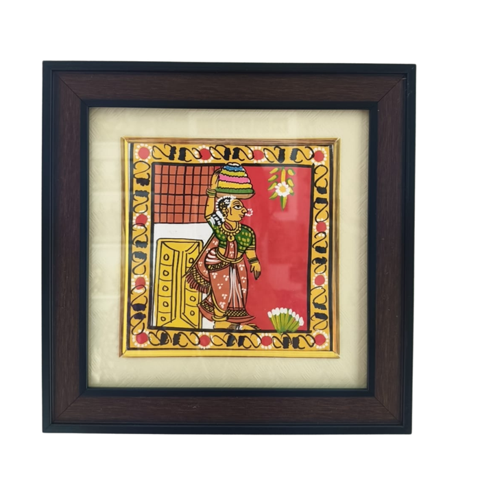 Hand-painted Cheriyal Bathukamma painting portrait of a woman.