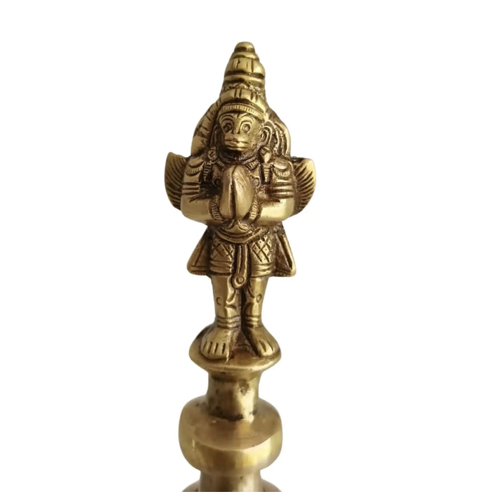 Handcrafted brass temple bell featuring a Garuda finial ghanta.