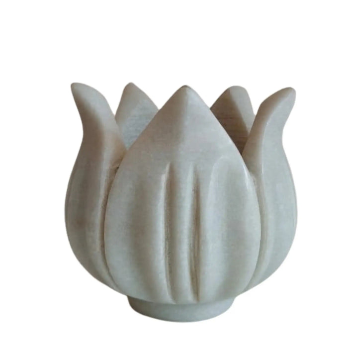Elegant white marble lotus candle stand for pooja and décor.