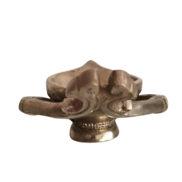 Handcrafted brass diya with intricate patterns, perfect for decorative brass lamps.