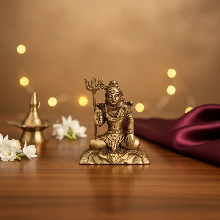 Exquisite handcrafted brass Lord Shiva idol meditating with Trishula.