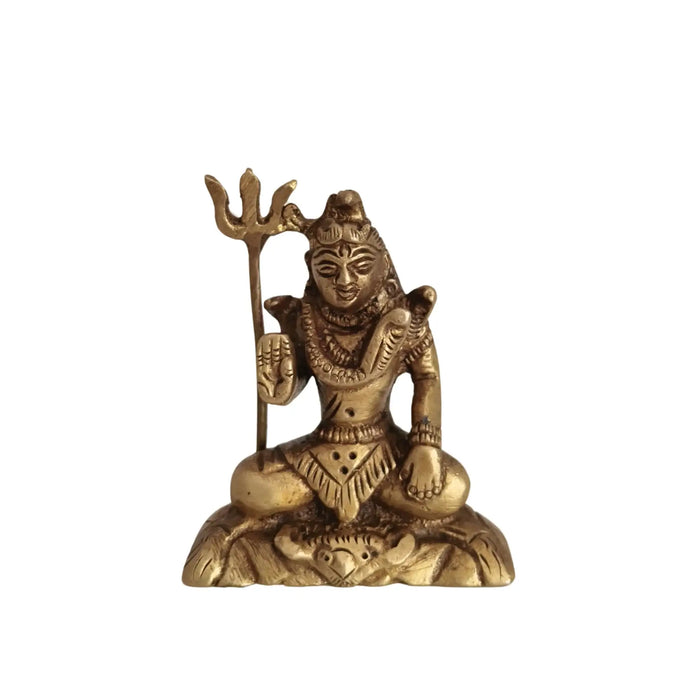 Exquisite handcrafted brass Lord Shiva idol in meditation, holding a trishula.