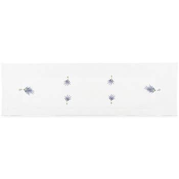 A white table runner with a hemstitch border. Bundles of lavender tied with white string are placed throughout the middle