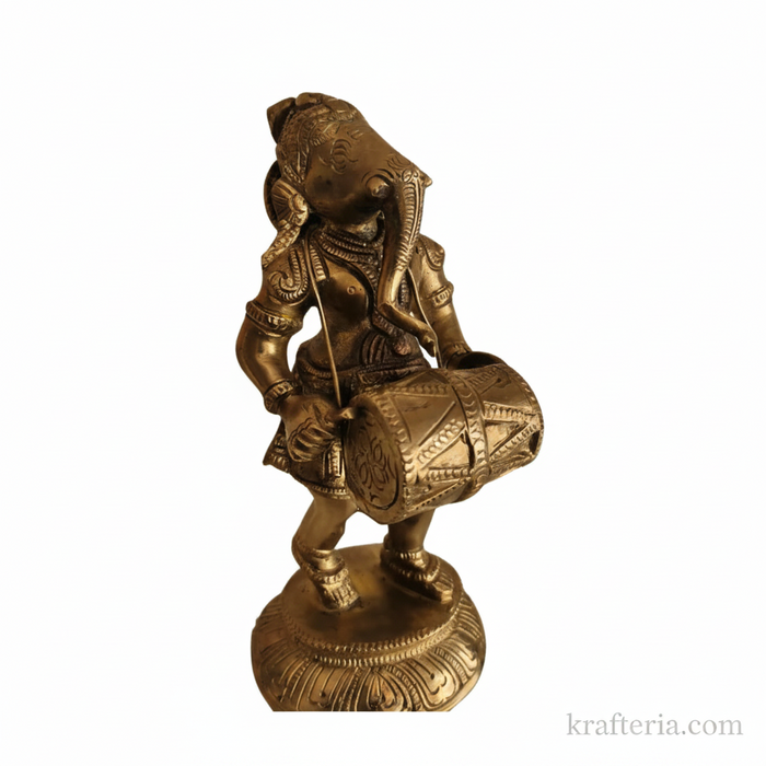 Brass Ganesha dholak statue altar piece for home decor.