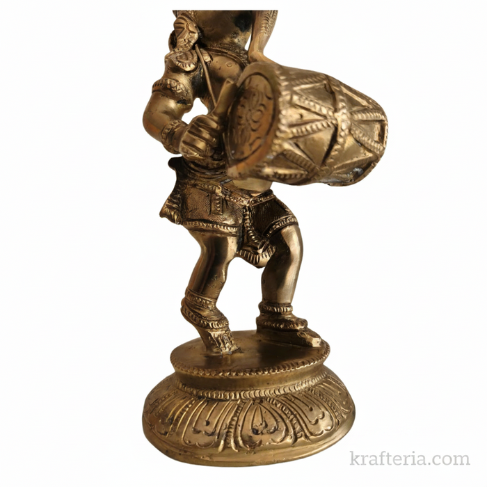 Brass Ganesha dholak statue altar for home decor.