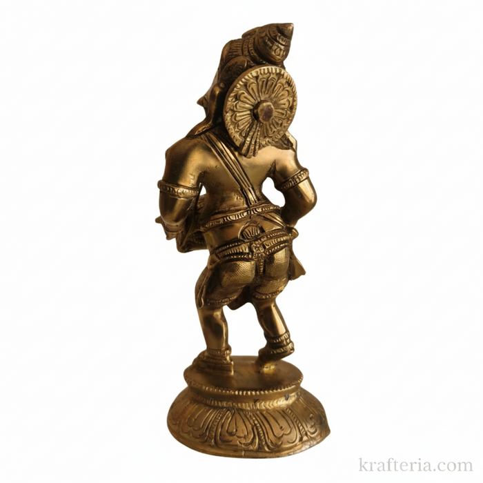 Brass Ganesha dholak statue for home altar decor.