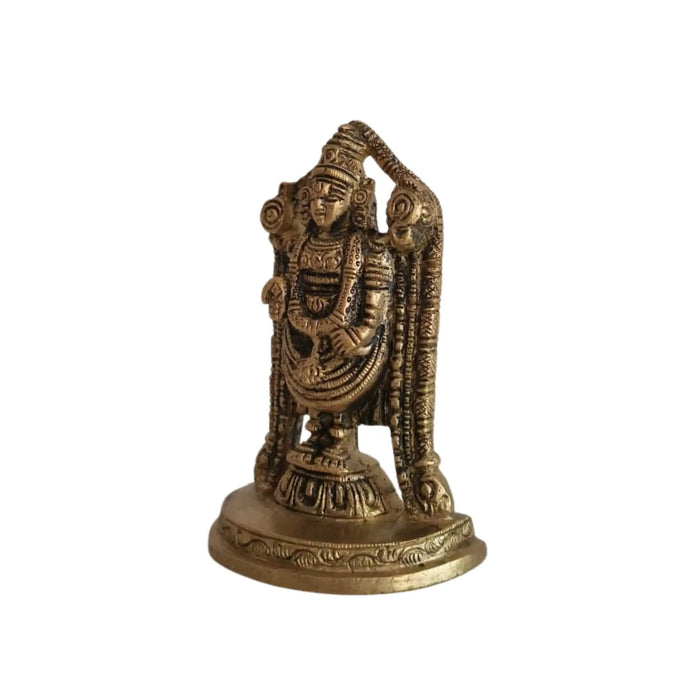 Detailed brass Lord Venkateswara idol with intricate craftsmanship.