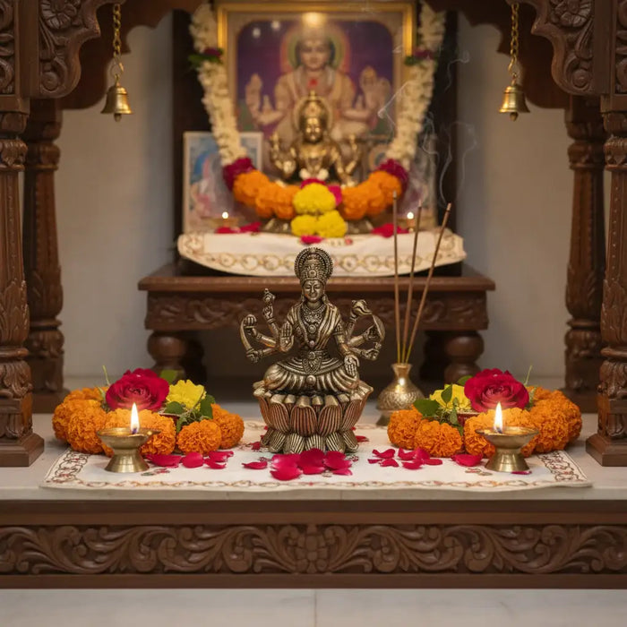 Brass mahalakshmi eight arms idol seated on a lotus base, a religious idol.