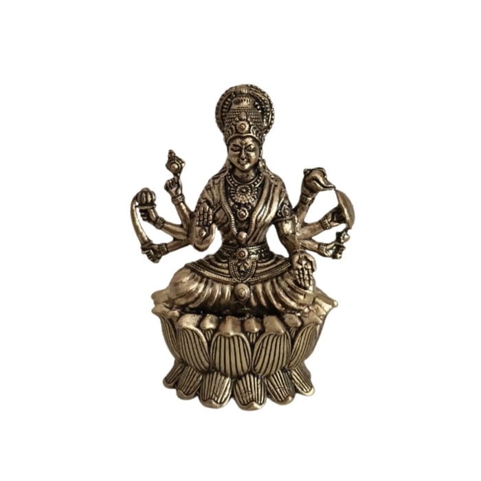 Brass mahalakshmi eight arms idol seated on lotus, religious statue.