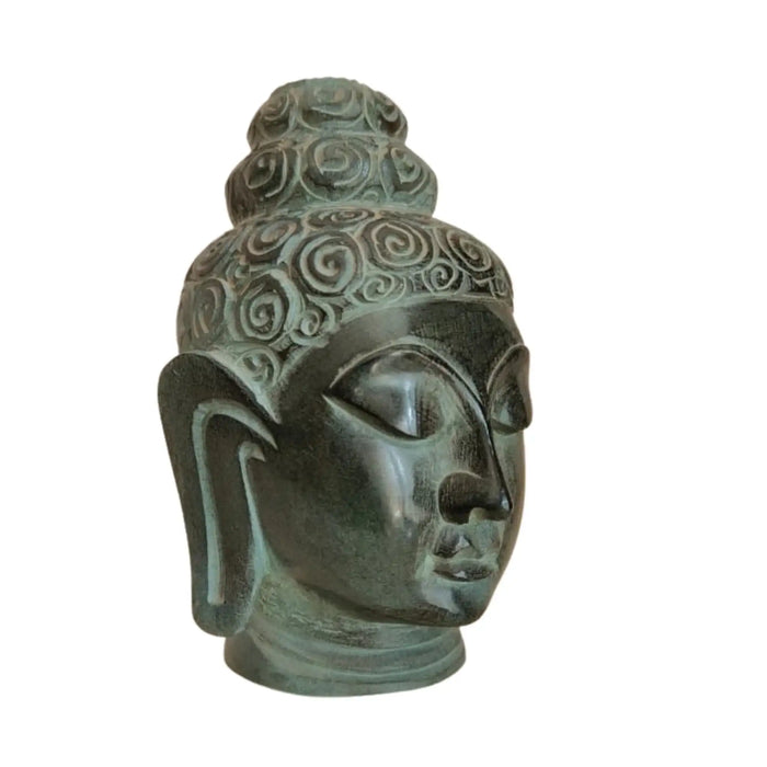 Decorative marble Buddha head statue for living room display.