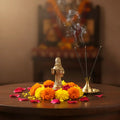 Miniature Goddess Annapoorna Idol in polished brass, a symbol of nourishment.